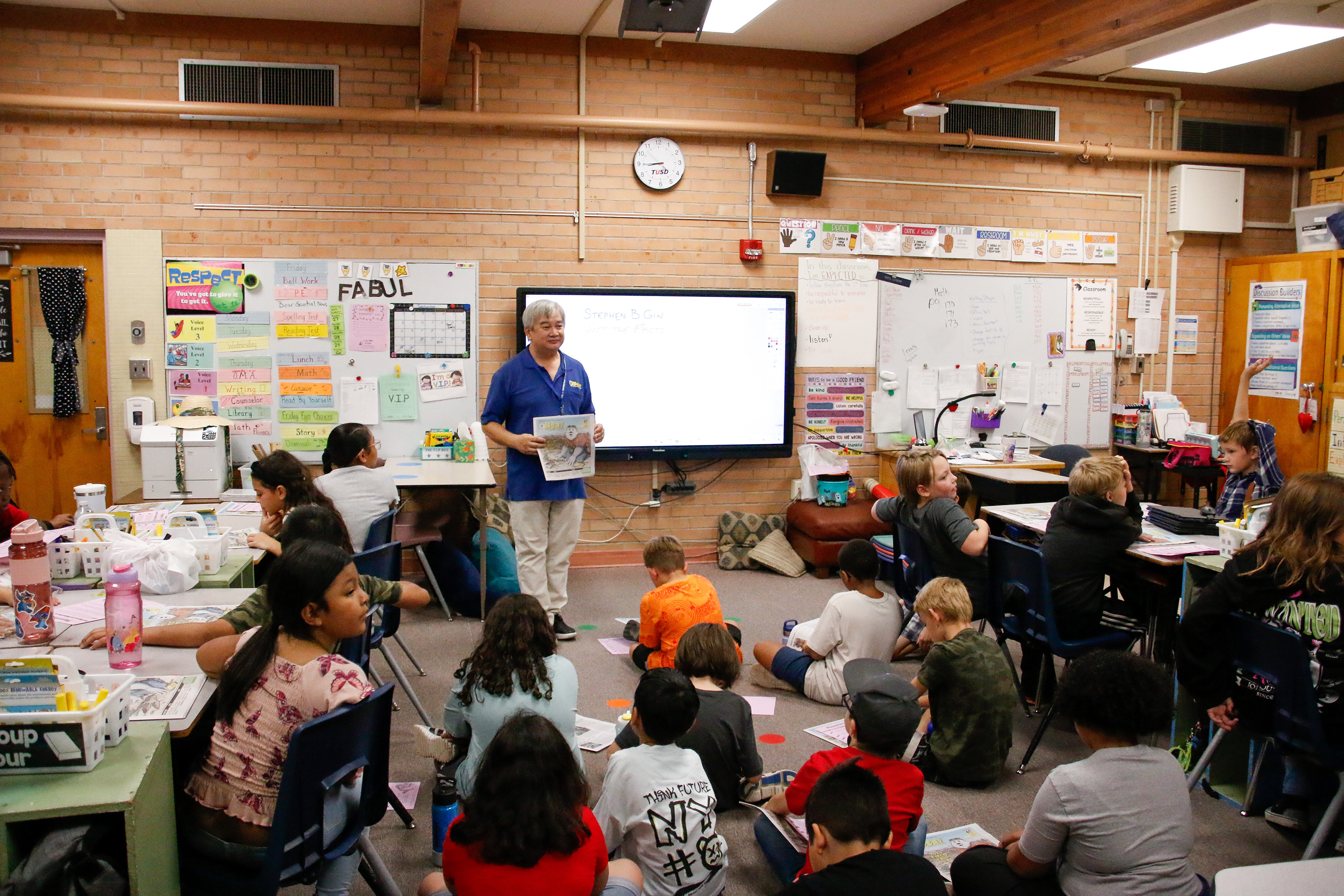 Bear Essential News' Stephen Gin addresses a classroom